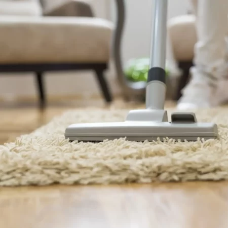 closeup-vacuum-cleaner-living-room-min-scaled